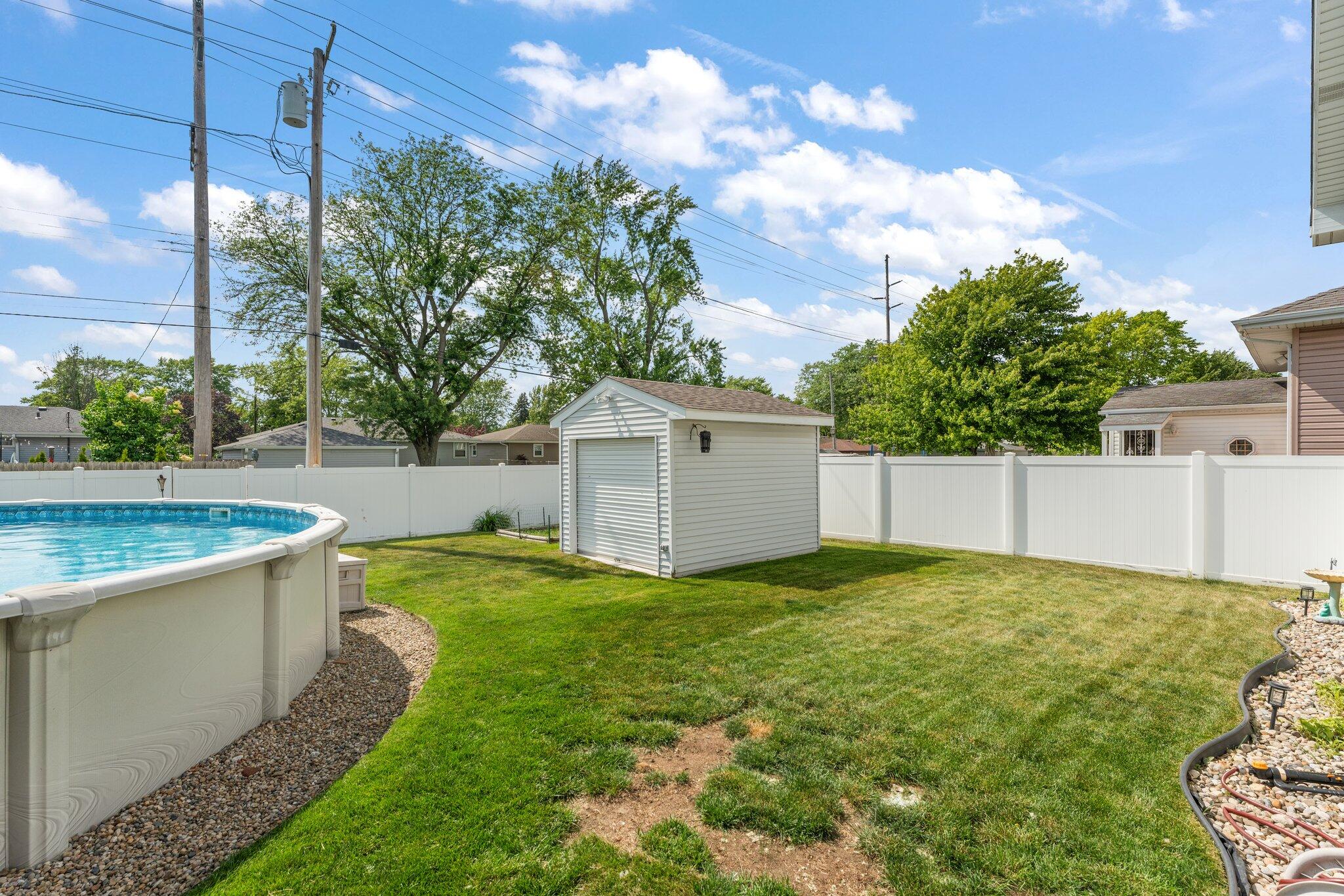658 Forest Avenue Griffith, IN 46319 - Photo 28 of 31 a view of a house with a yard and potted plants