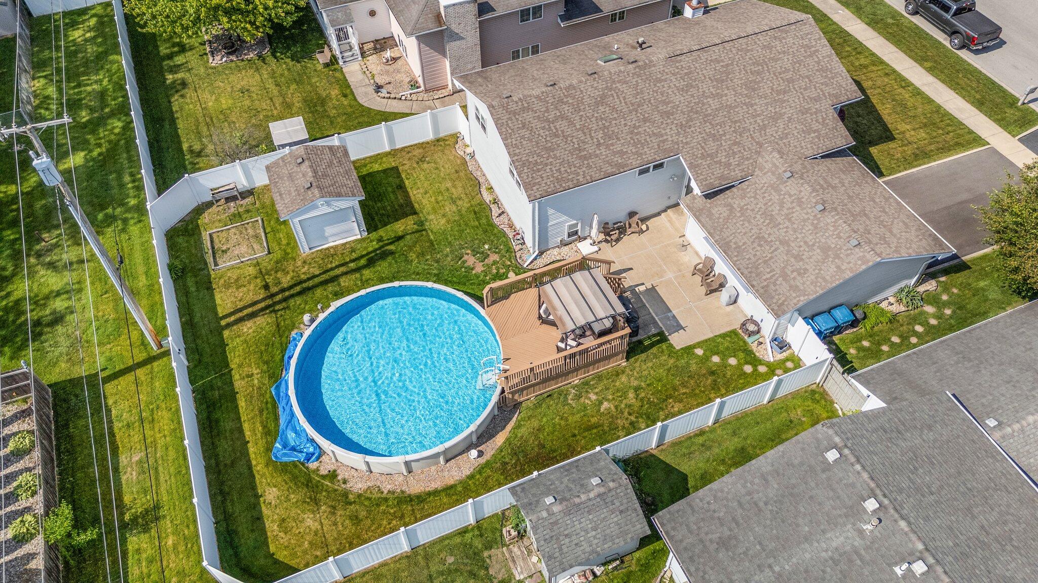 658 Forest Avenue Griffith, IN 46319 - Photo 31 of 31 an aerial view of a house with swimming pool and outdoor space