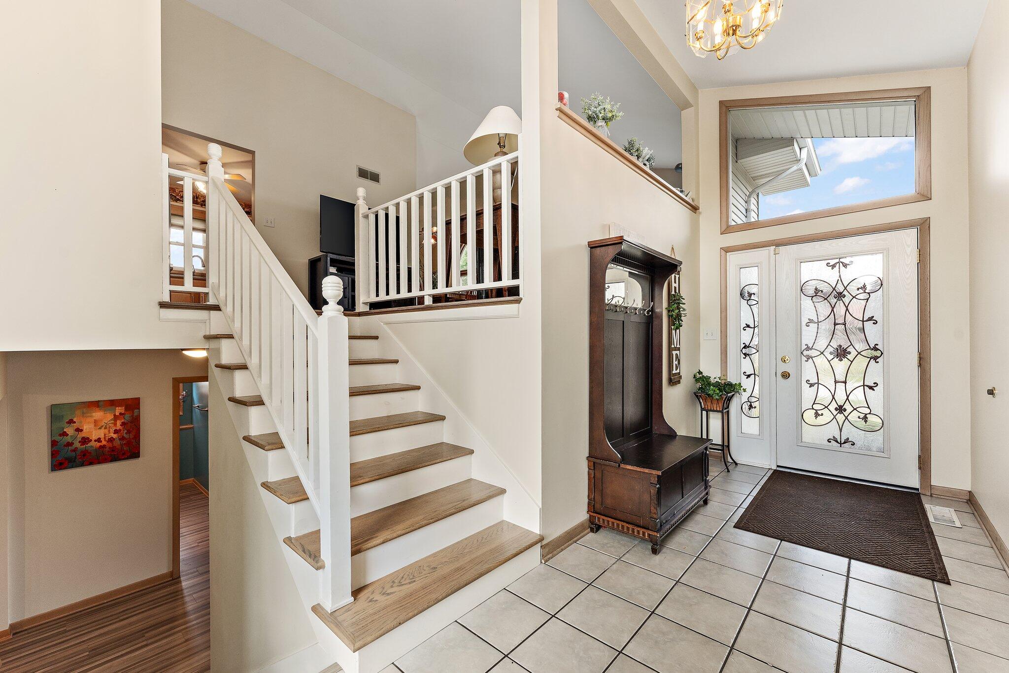 658 Forest Avenue Griffith, IN 46319 - Photo 4 of 31 a view of entryway with furniture and stairs