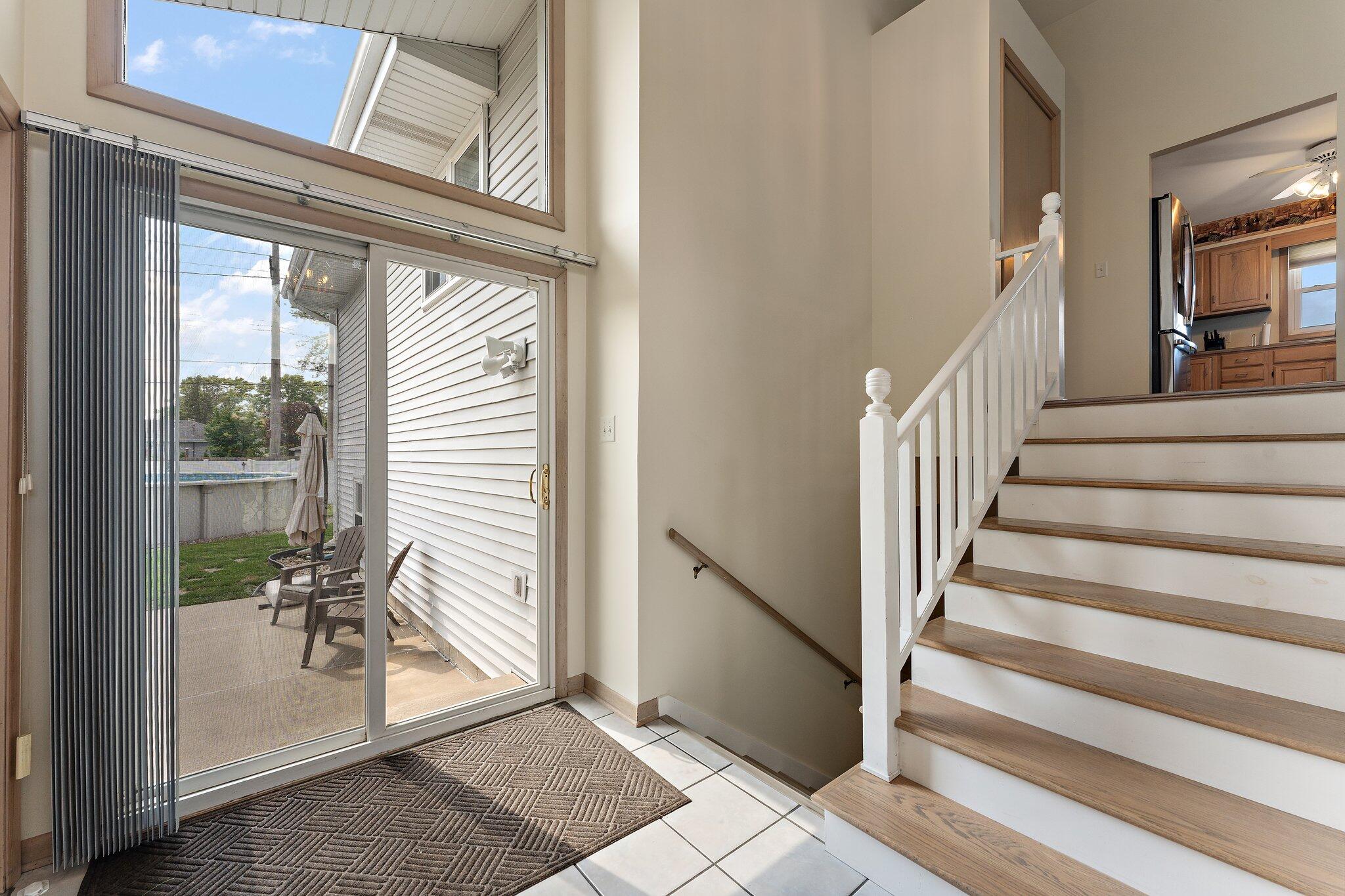 658 Forest Avenue Griffith, IN 46319 - Photo 5 of 31 a view of entryway and hall with wooden floor