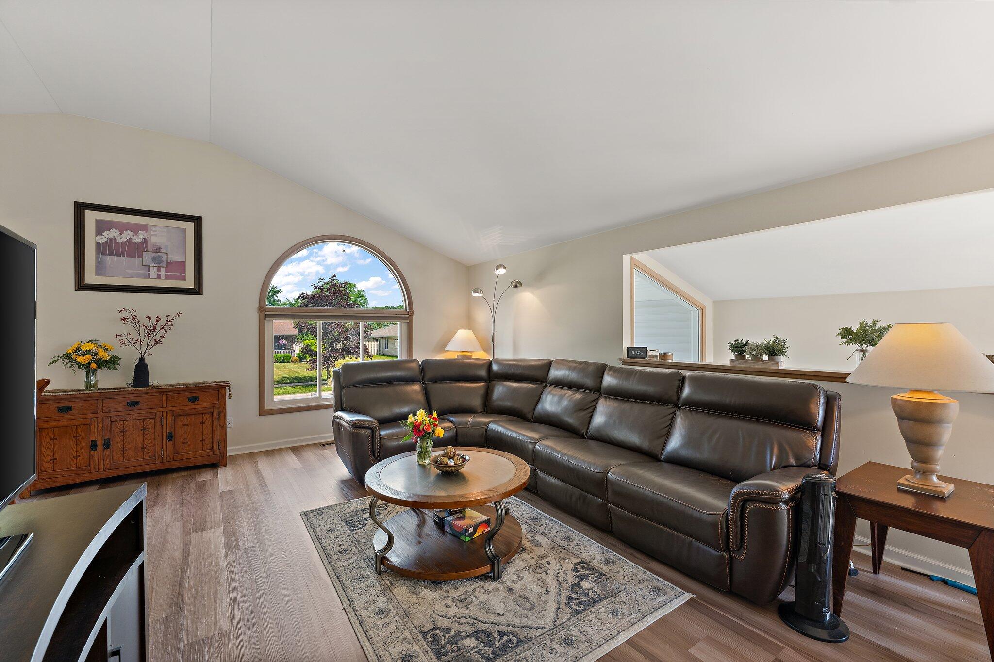 658 Forest Avenue Griffith, IN 46319 - Photo 7 of 31 a living room with furniture and a large window