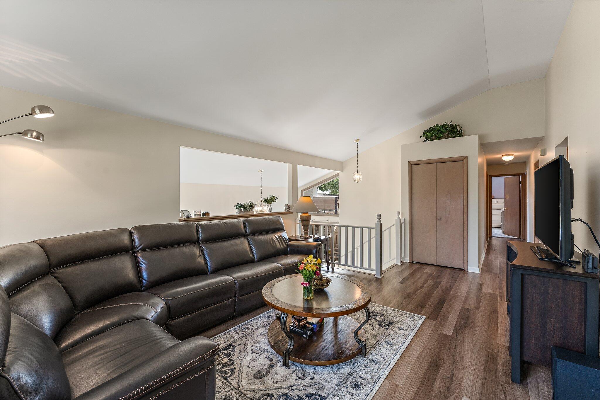 658 Forest Avenue Griffith, IN 46319 - Photo 8 of 31 a living room with furniture and a flat screen tv