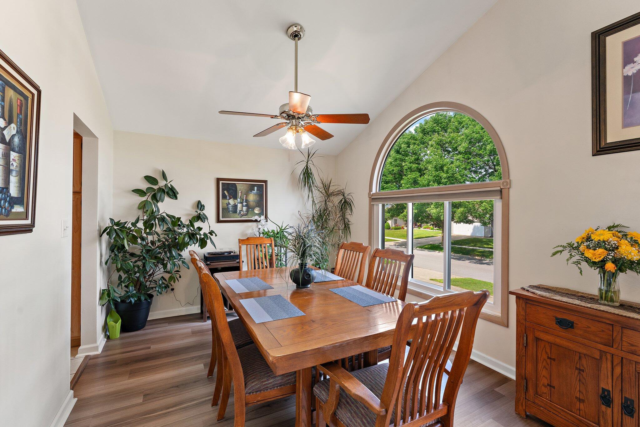 658 Forest Avenue Griffith, IN 46319 - Photo 10 of 31 a view of a dining room with furniture window and wooden floor