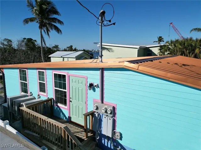 a view of balcony with furniture