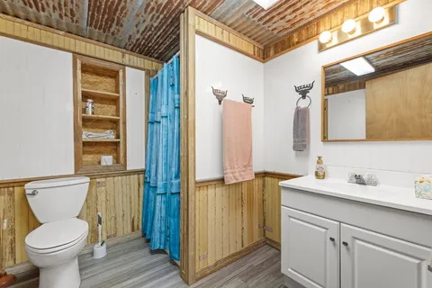 a view of a hallway with washer and dryer