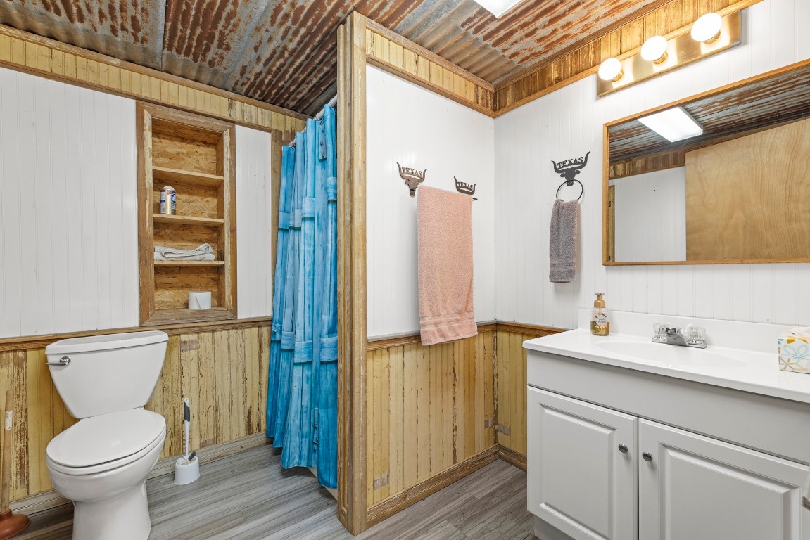 723 Fm 2926 Baird, TX 79504 - Photo 24 of 26 a bathroom with a sink toilet and shower