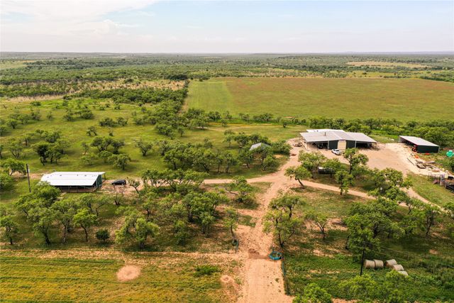 a view of a city with an ocean view