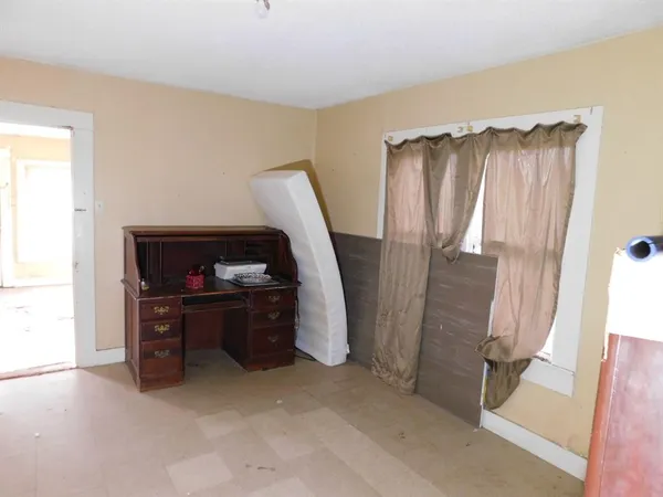 a view of a storage & utility room with closet
