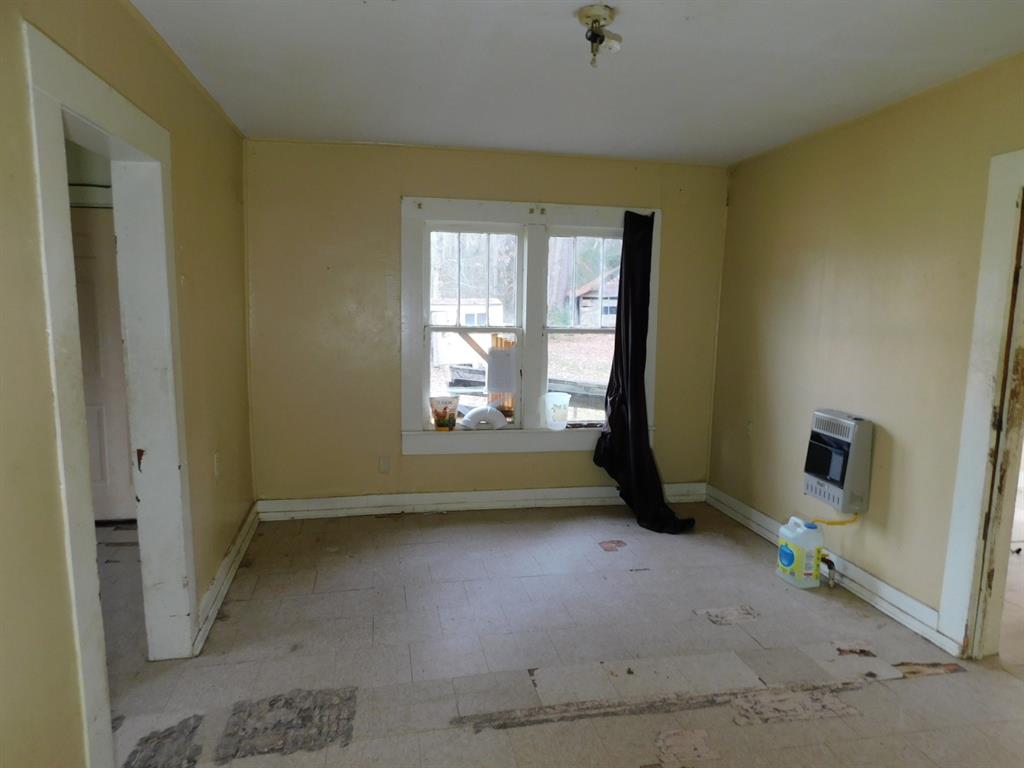 25707 Highway 371 Sarepta, LA 71071 - Photo 13 of 30 an empty room with windows