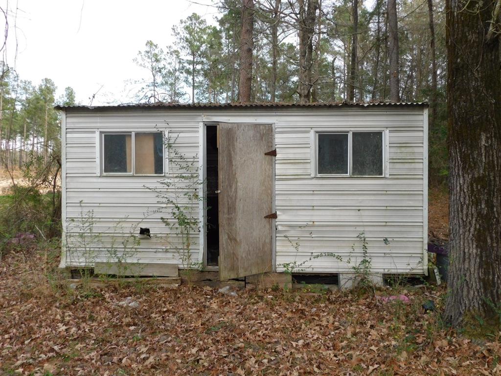 25707 Highway 371 Sarepta, LA 71071 - Photo 4 of 30 a view of a house with a yard