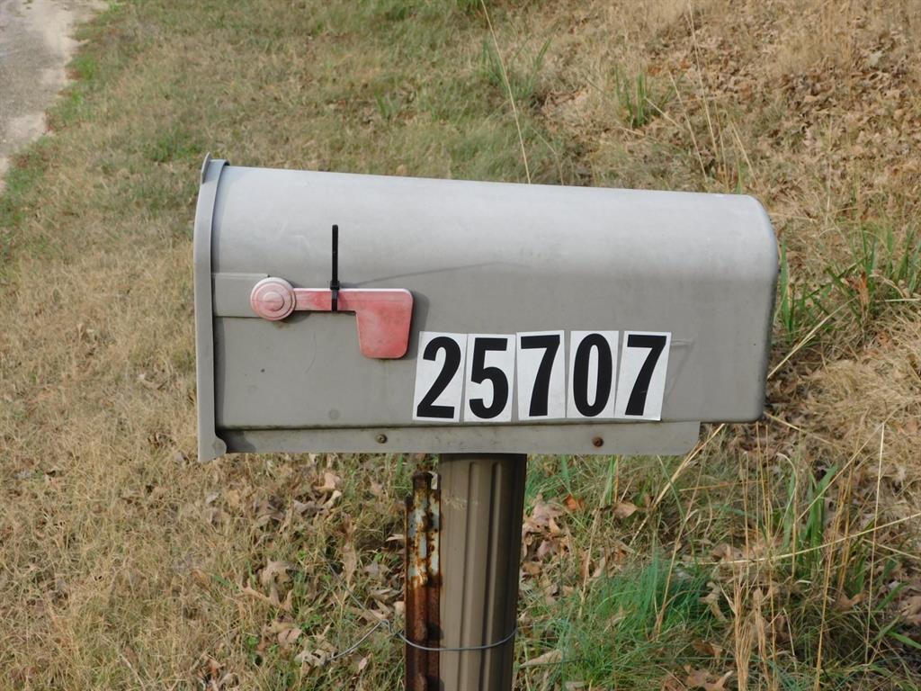 25707 Highway 371 Sarepta, LA 71071 - Photo 7 of 30 a view of a sign board with wooden fence