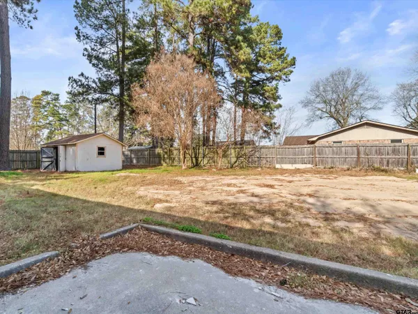a house with trees in front of it