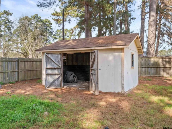 a picture of a bathroom with a shower