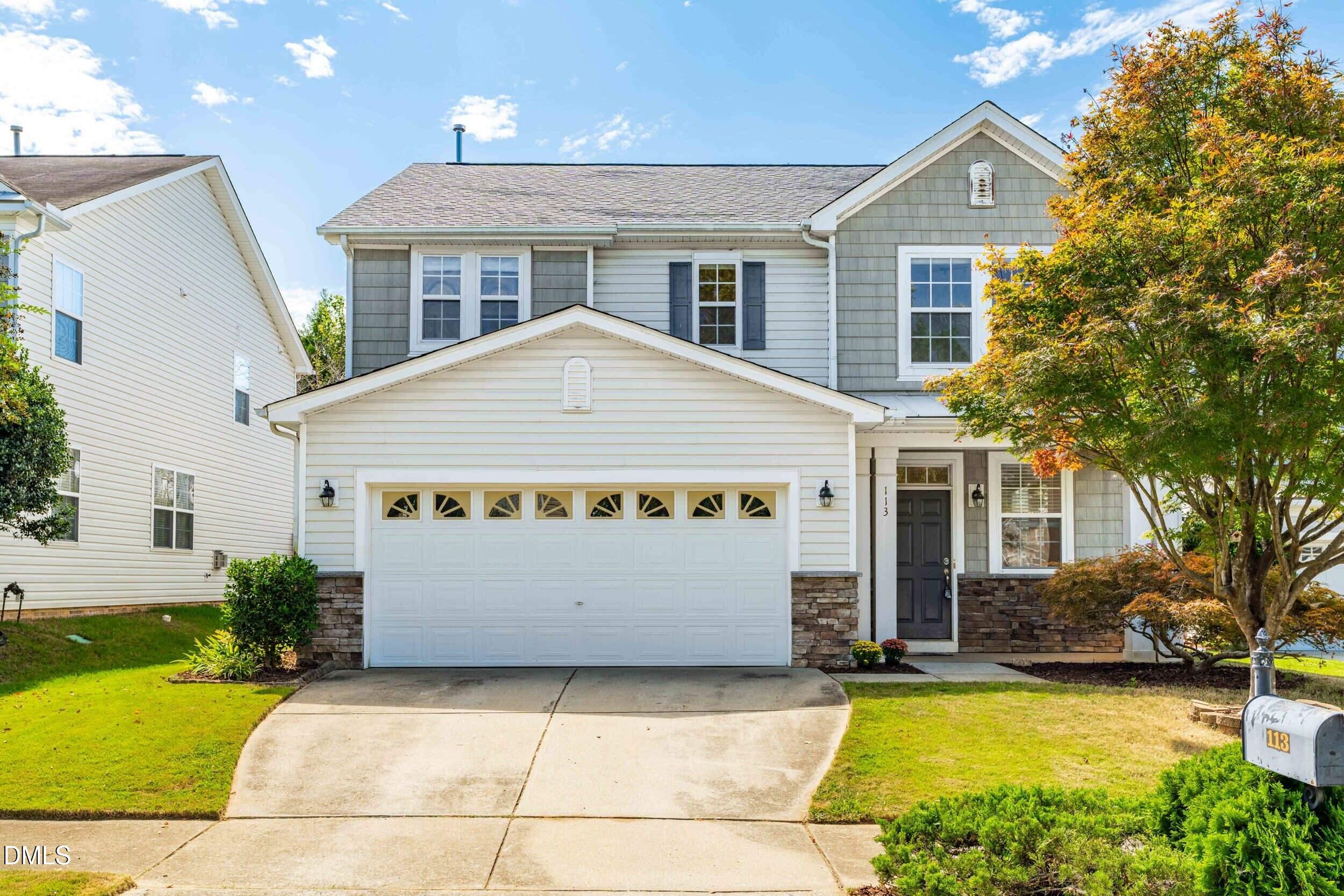 113 Cupp Court Raleigh, NC 27603 - Photo 1 of 29 a front view of a house with yard
