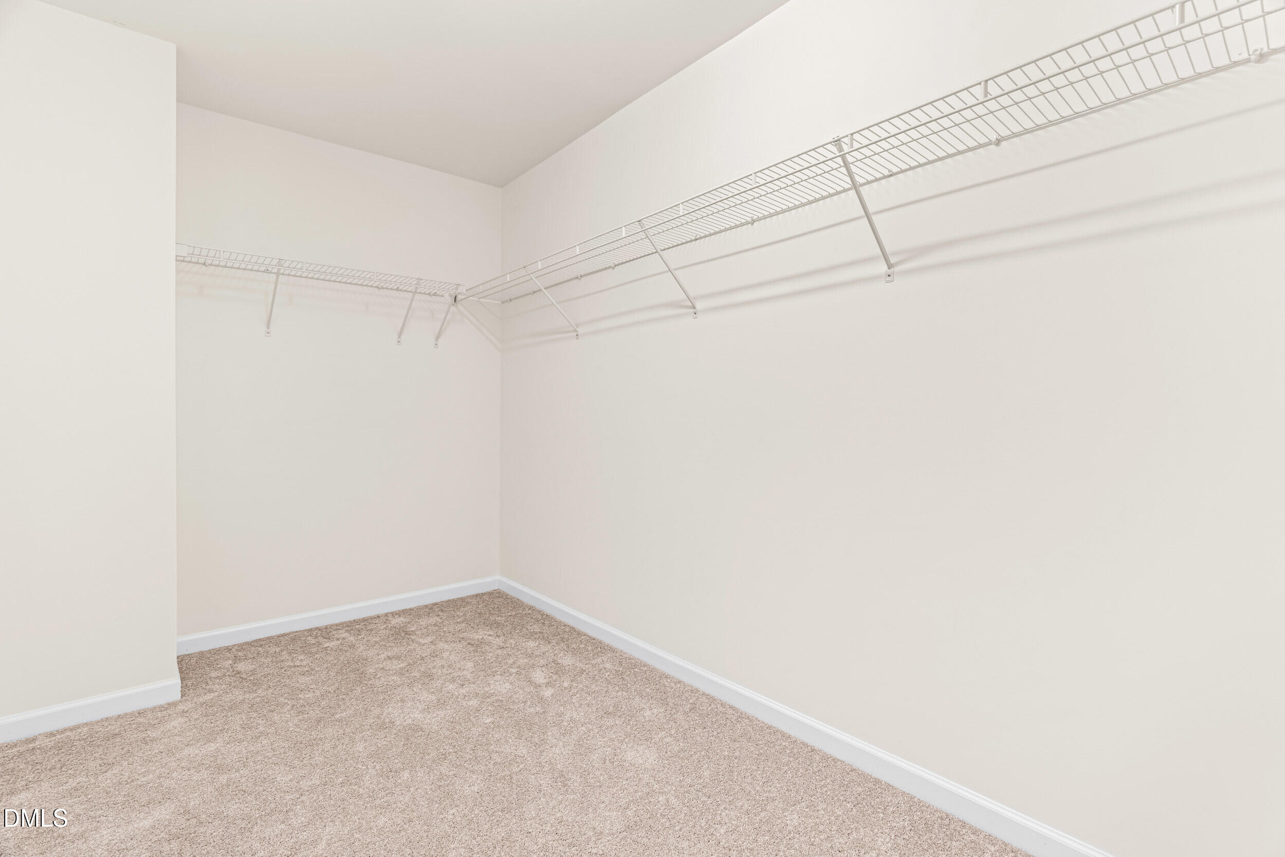 113 Cupp Court Raleigh, NC 27603 - Photo 14 of 29 a view of a room with racks on the wall