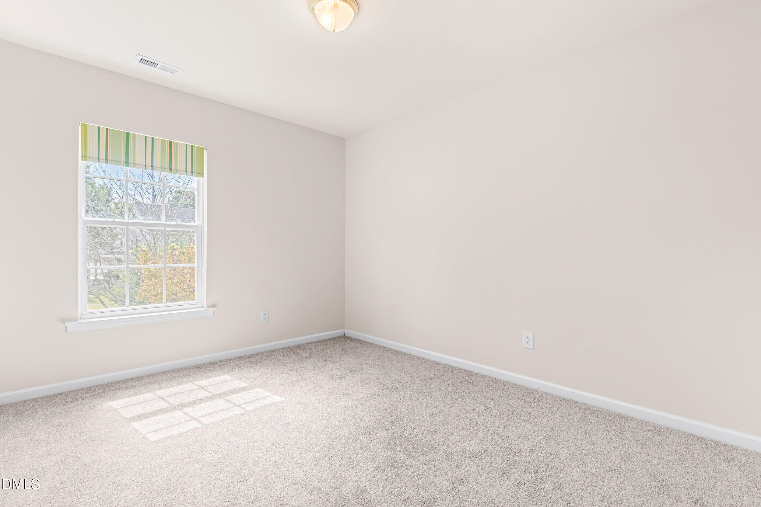 113 Cupp Court Raleigh, NC 27603 - Photo 17 of 29 an empty room with a window
