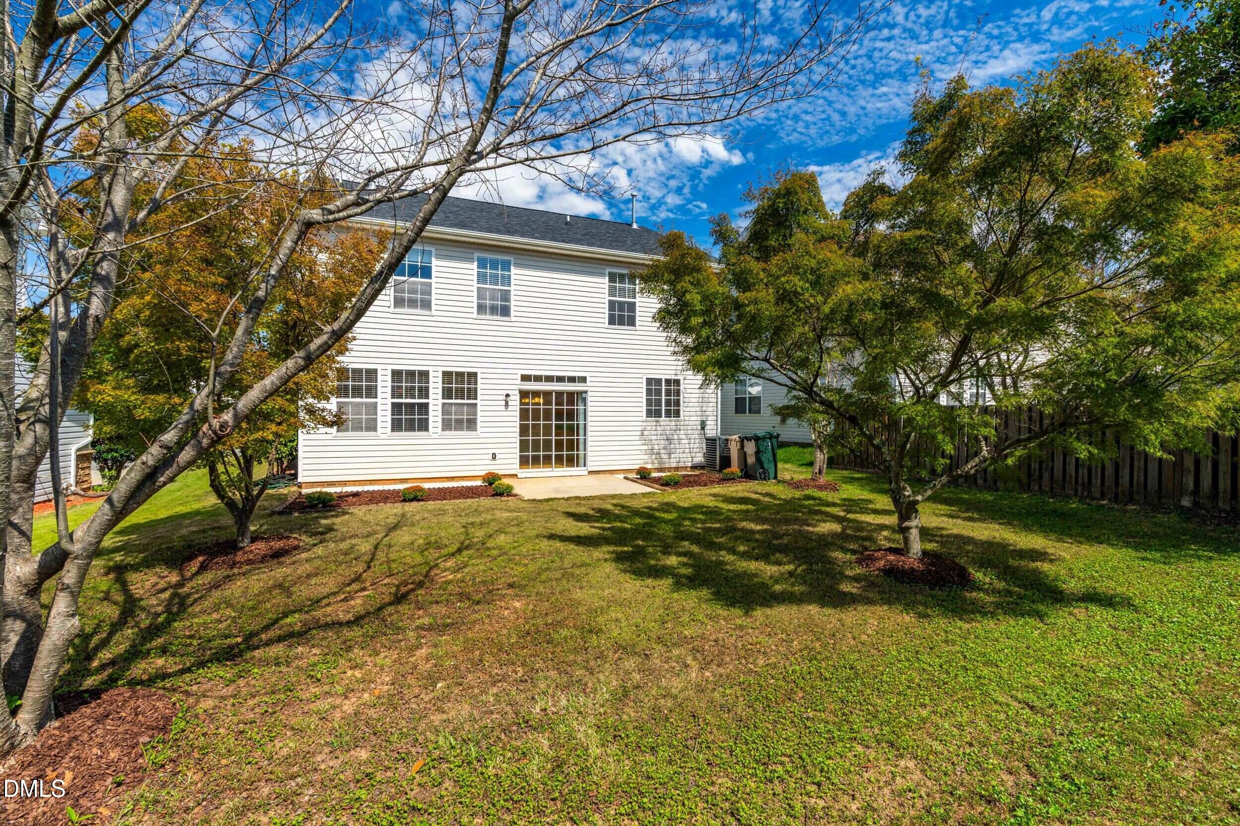113 Cupp Court Raleigh, NC 27603 - Photo 24 of 29 a house view with a garden space
