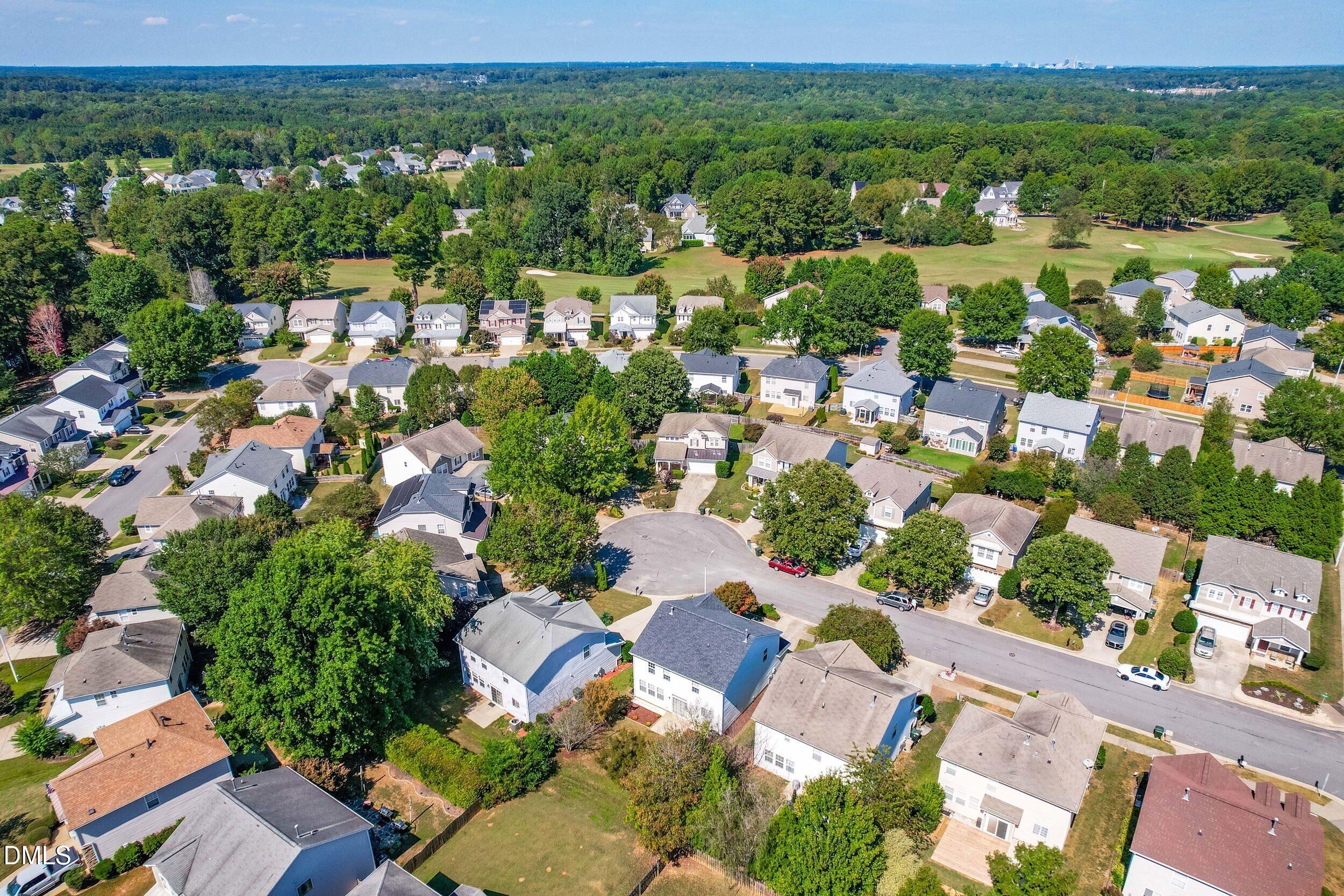 113 Cupp Court Raleigh, NC 27603 - Photo 28 of 29 an aerial view of a city with lots of residential buildings
