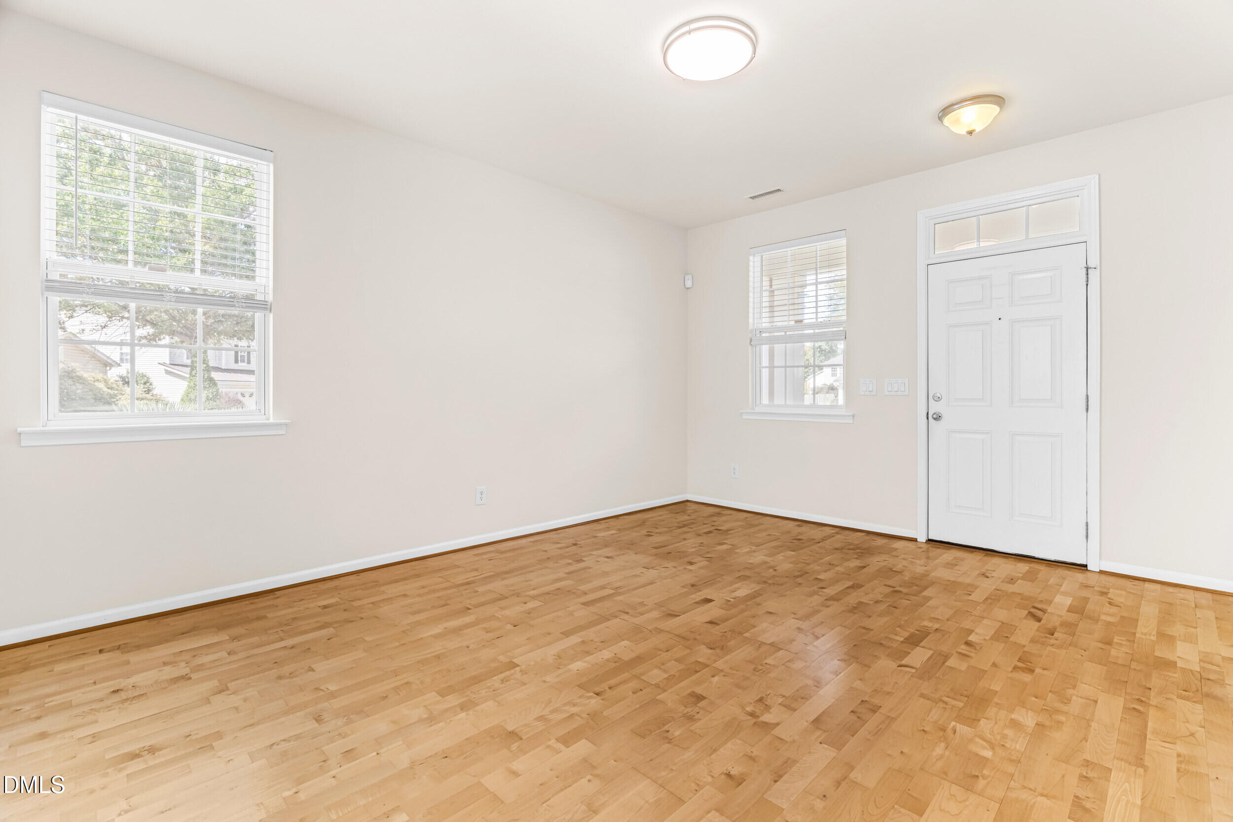 113 Cupp Court Raleigh, NC 27603 - Photo 5 of 29 an empty room with windows