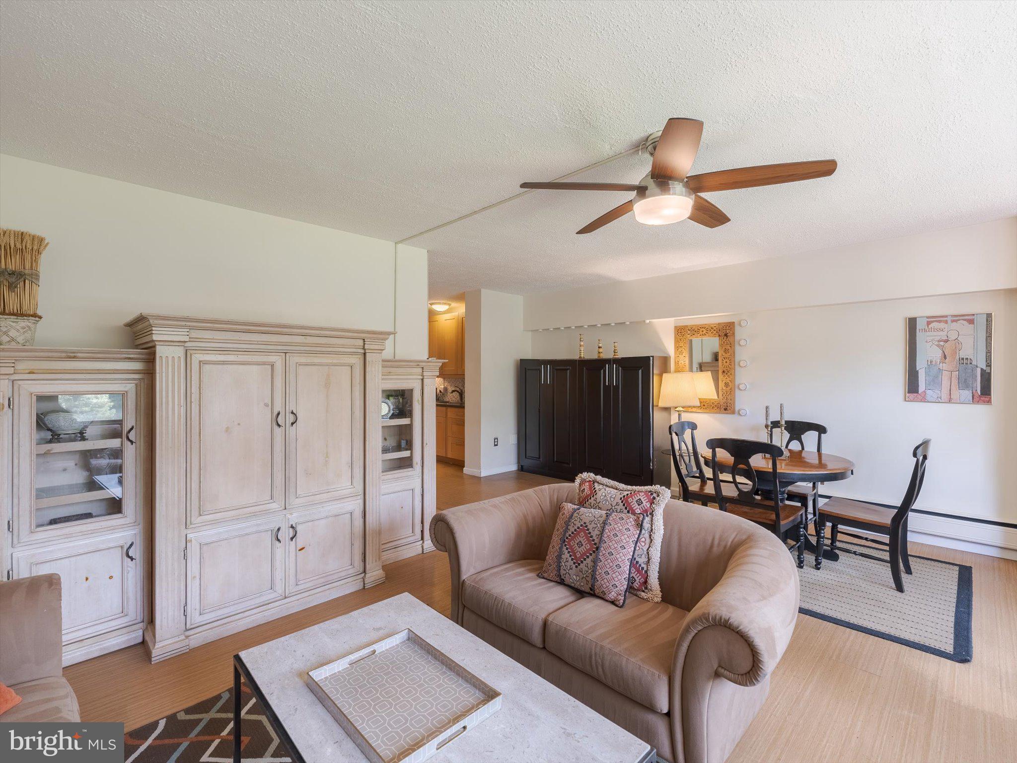 7900 Old York Road, Unit 508B Elkins Park, PA 19027 - Photo 5 of 21 included black Murphy bed is in background