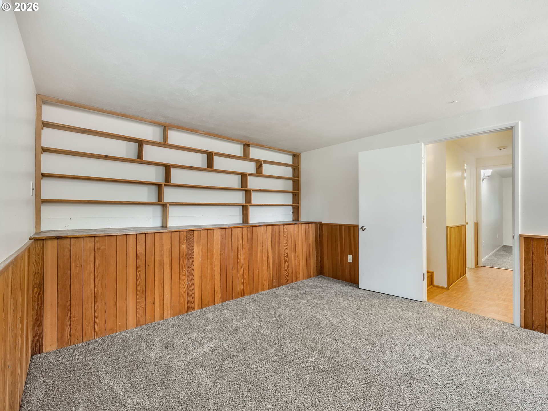 91923 Ridge Road Warrenton, OR 97146 - Photo 24 of 35 a view of empty room with wooden walls