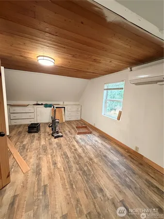 a view of kitchen and empty room
