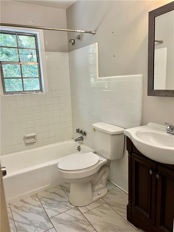 3211 Flamingo Drive East Point, GA 30344 - Photo 12 of 26 a bathroom with a sink toilet and shower
