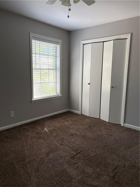 3211 Flamingo Drive East Point, GA 30344 - Photo 14 of 26 an empty room with windows and closet