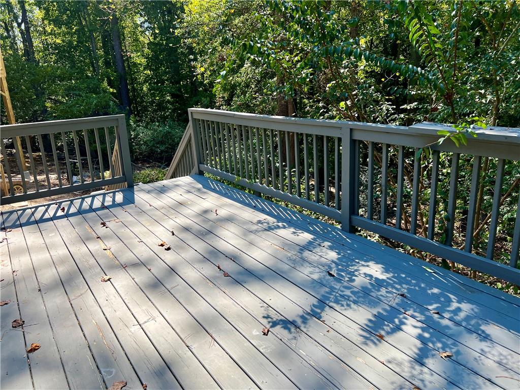 3211 Flamingo Drive East Point, GA 30344 - Photo 25 of 26 a view of deck with two chairs and wooden floor