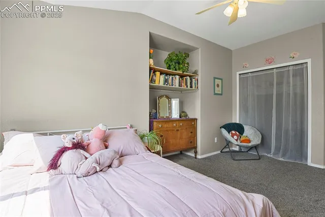 a bedroom with a bed and furniture