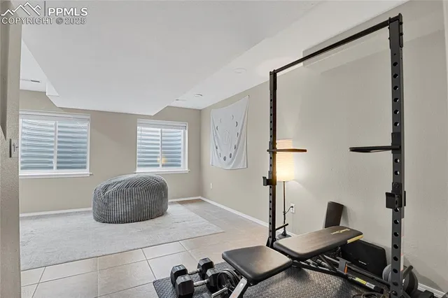 a workspace with furniture and window