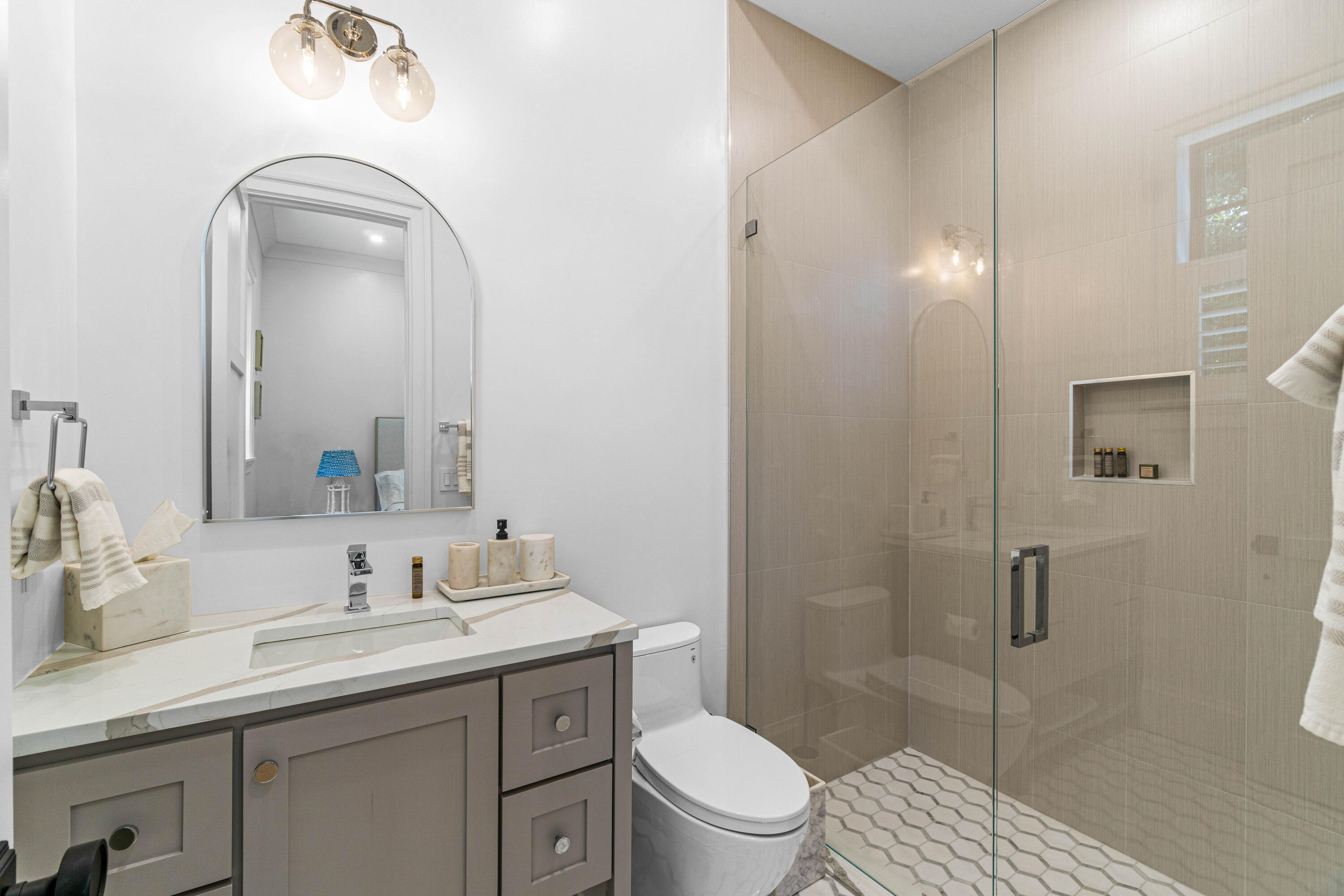 18 Northwest 15th Street Delray Beach, FL 33444 - Photo 15 of 29 a bathroom with a sink a toilet and shower