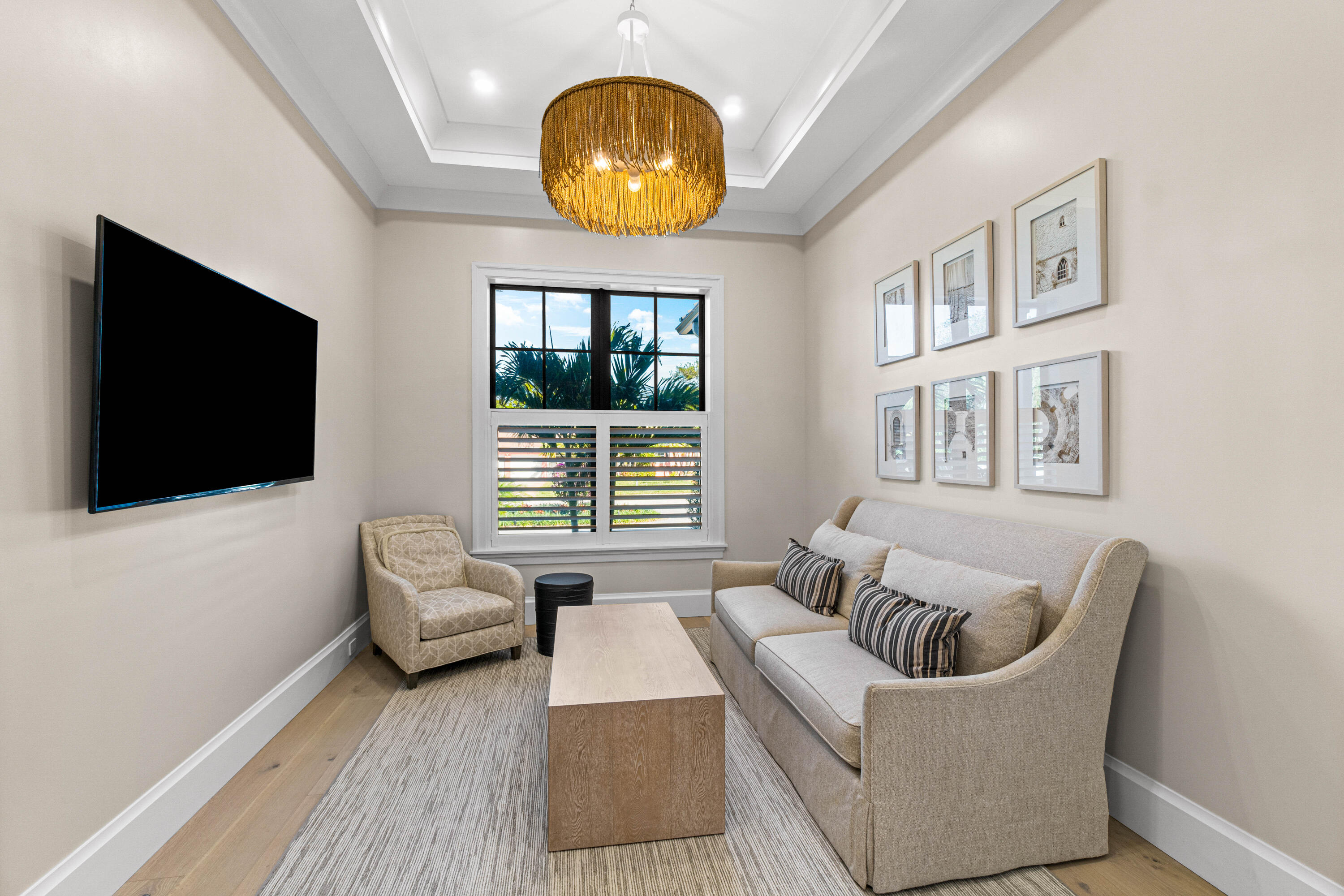 18 Northwest 15th Street Delray Beach, FL 33444 - Photo 18 of 29 a living room with furniture and a flat screen tv