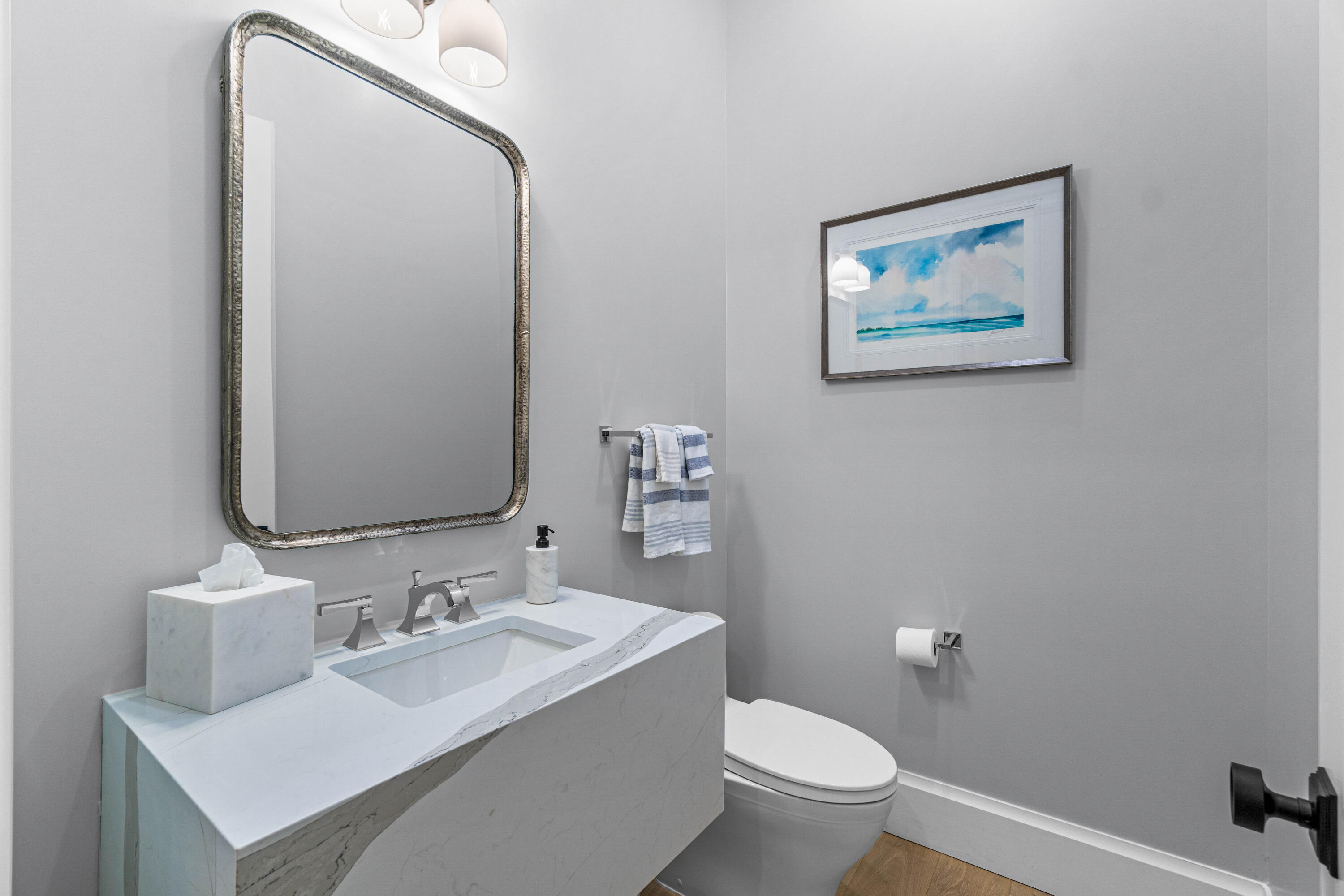 18 Northwest 15th Street Delray Beach, FL 33444 - Photo 19 of 29 a bathroom with a toilet sink and mirror