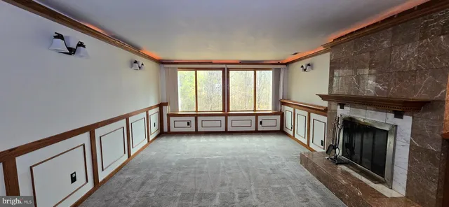 a view of a living room and window
