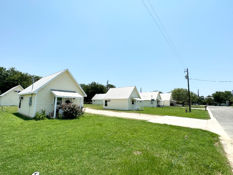 403 Free Timber Lane Stockdale, TX 78160 - Photo 2 of 9 a house view with a garden space