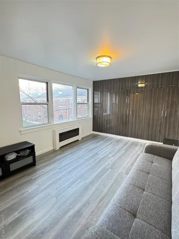 a view of livingroom with furniture and window
