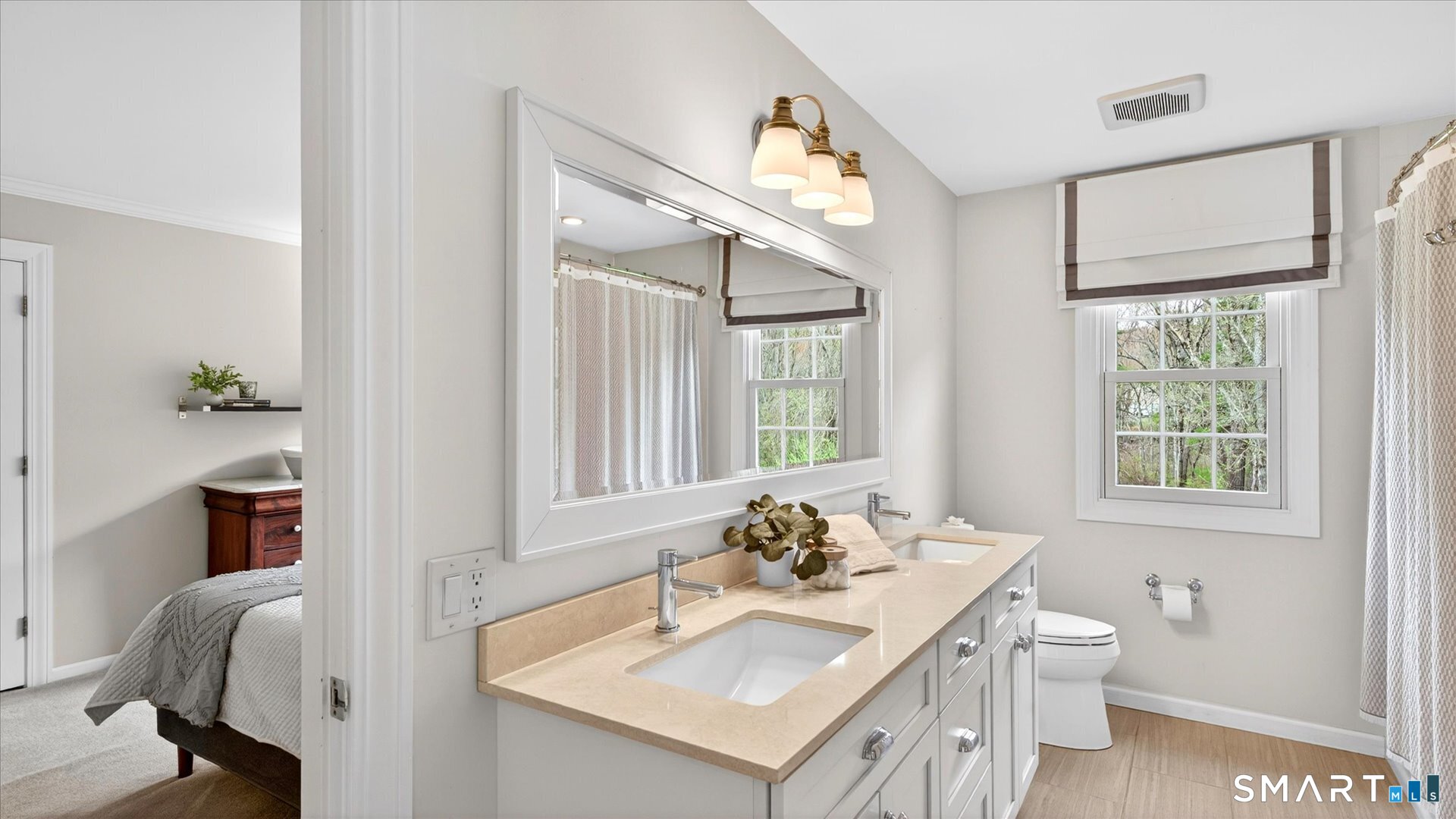 138 Cold Spring Road Avon, CT 06001 - Photo 24 of 36 Remodeled full bath with double sinks, quartz counters and tub/shower.