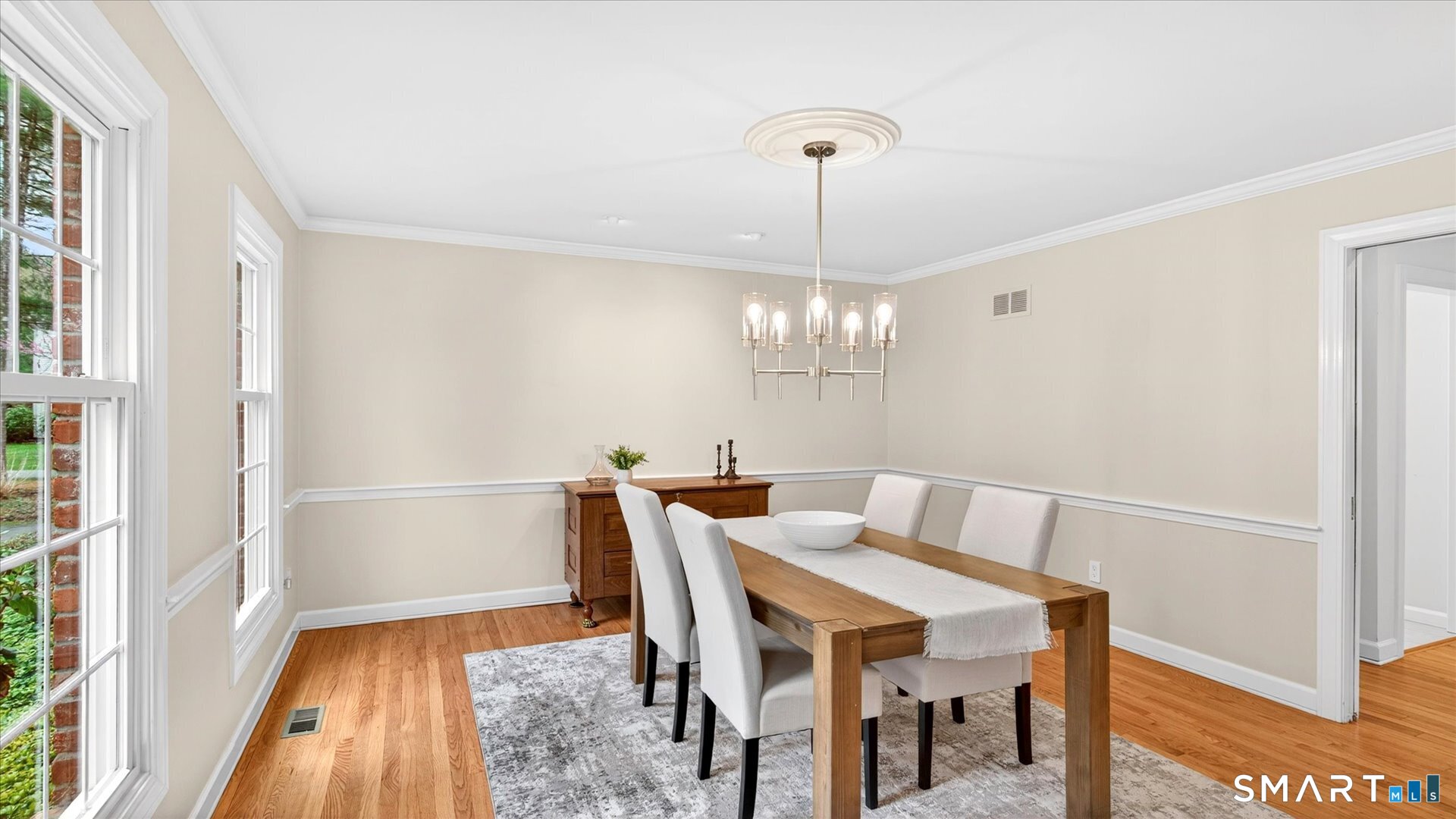 138 Cold Spring Road Avon, CT 06001 - Photo 6 of 36 Formal dining room with hardwood floors.
