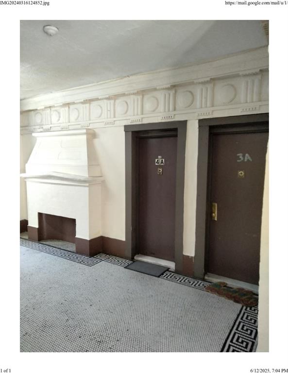 2107 Beverley Road Brooklyn, NY 11226 - Photo 8 of 9 a view of an entryway with a fireplace