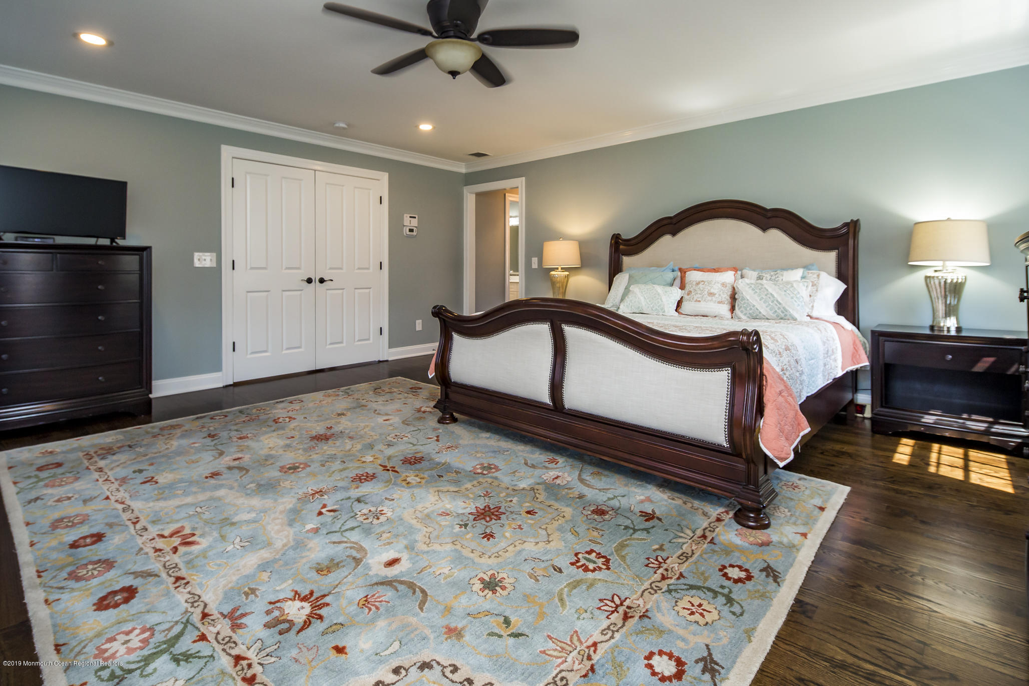 3 Evergreen Drive Rumson, NJ 07760 - Photo 19 of 37 a bedroom with a bed and wooden floor