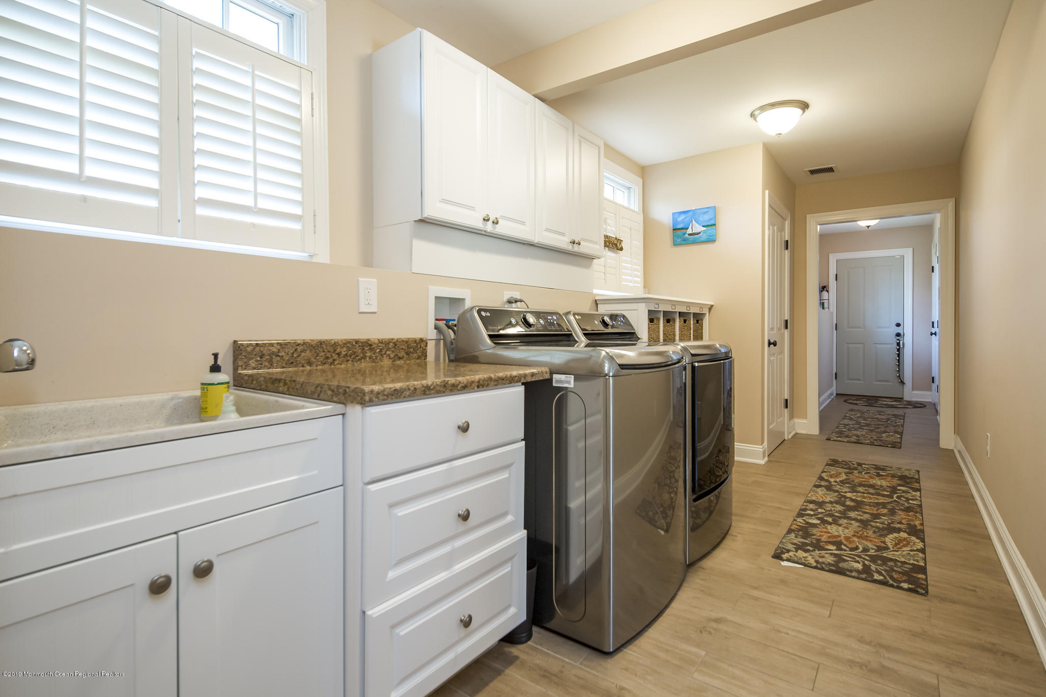 3 Evergreen Drive Rumson, NJ 07760 - Photo 25 of 37 a kitchen with stainless steel appliances granite countertop a stove a sink and a refrigerator