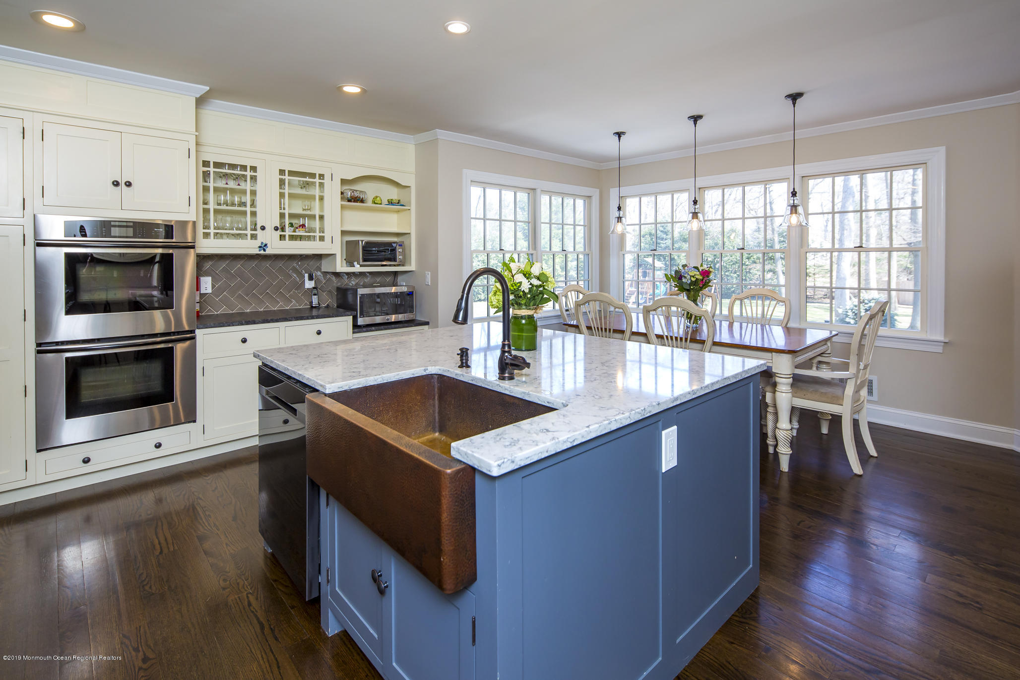3 Evergreen Drive Rumson, NJ 07760 - Photo 3 of 37 a kitchen with stainless steel appliances granite countertop a stove a sink and a microwave