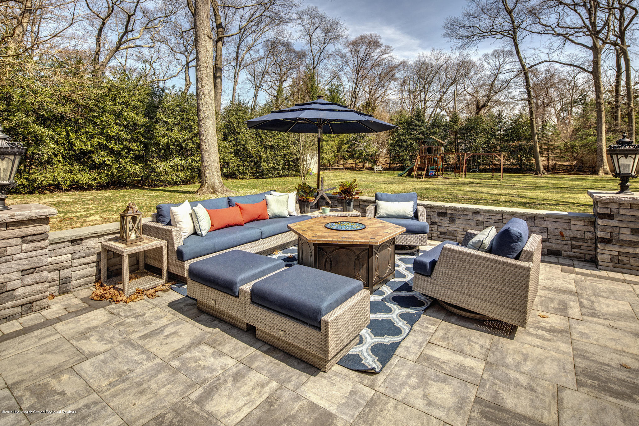 3 Evergreen Drive Rumson, NJ 07760 - Photo 32 of 37 a outdoor space with patio lots of furniture and umbrella