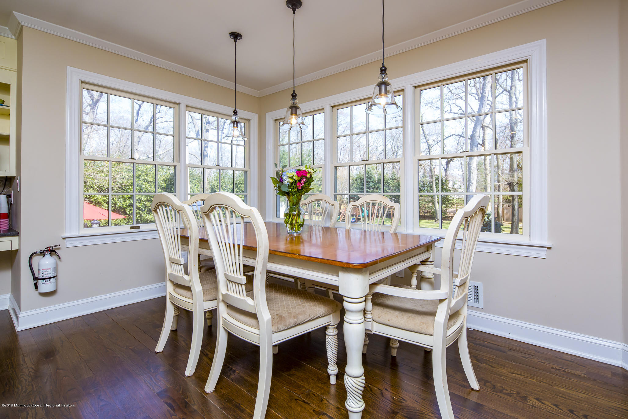 3 Evergreen Drive Rumson, NJ 07760 - Photo 8 of 37 a view of a dining room with furniture window and wooden floor