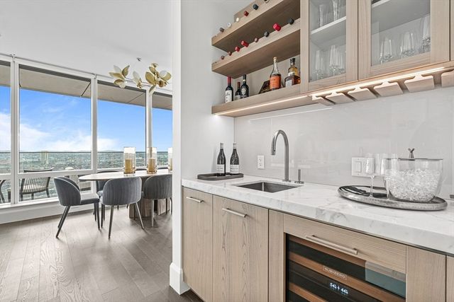 a kitchen with a table and chairs in it