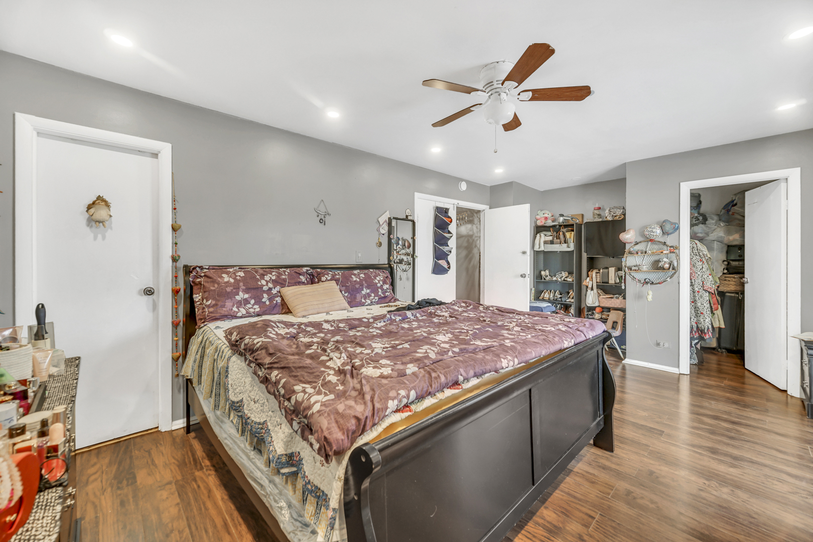 1269 Court D Hanover Park, IL 60133 - Photo 12 of 19 a bed room with a bed and a ceiling fan