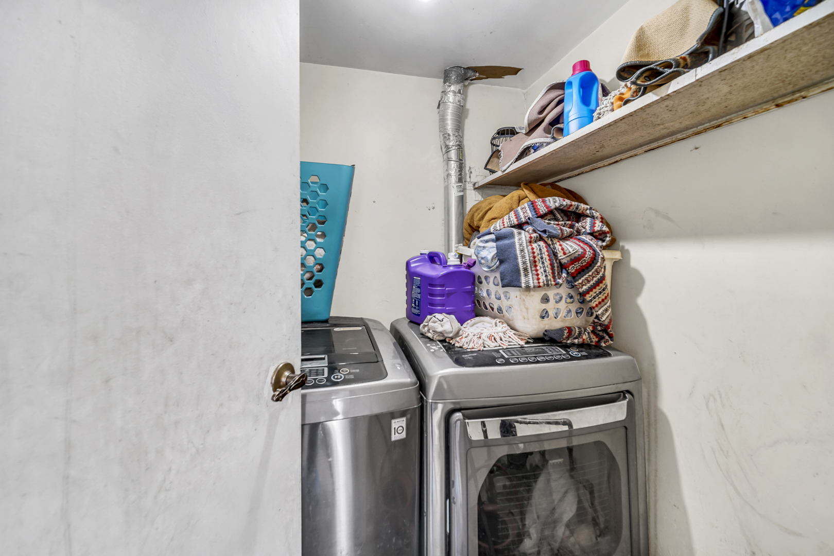 1269 Court D Hanover Park, IL 60133 - Photo 19 of 19 a utility room with dryer and washer