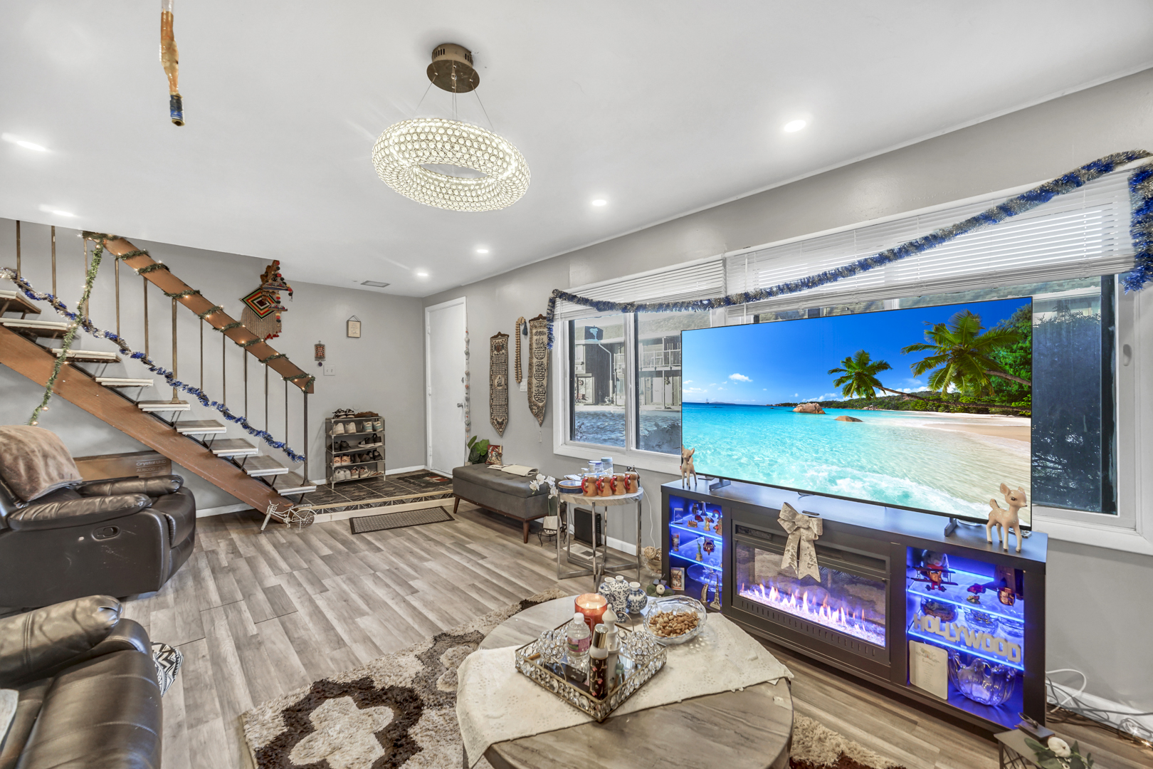 1269 Court D Hanover Park, IL 60133 - Photo 3 of 19 a living room with fireplace furniture and a flat screen tv