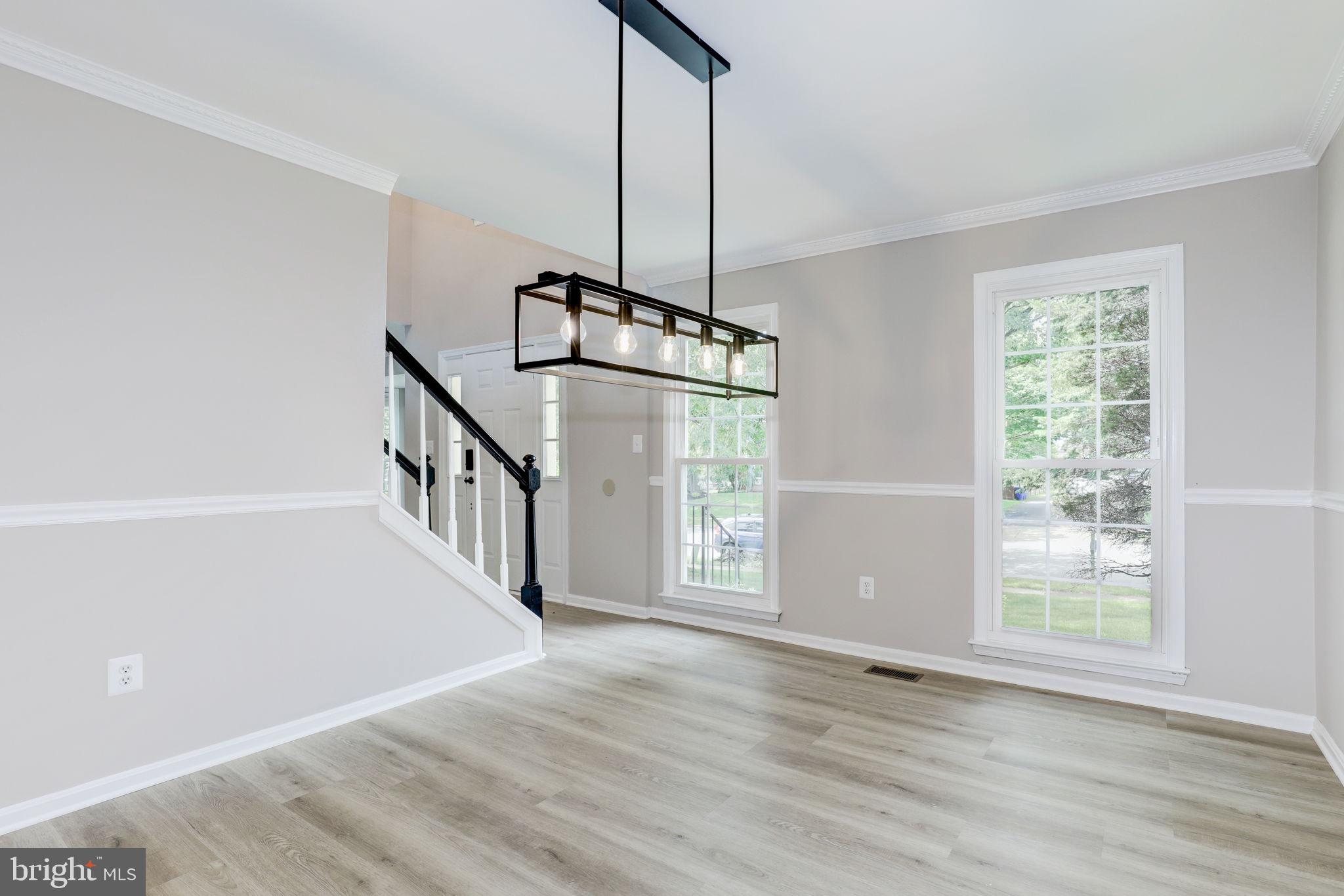 14422 Old Stage Road Bowie, MD 20720 - Photo 21 of 65 a view of an entryway with wooden floor